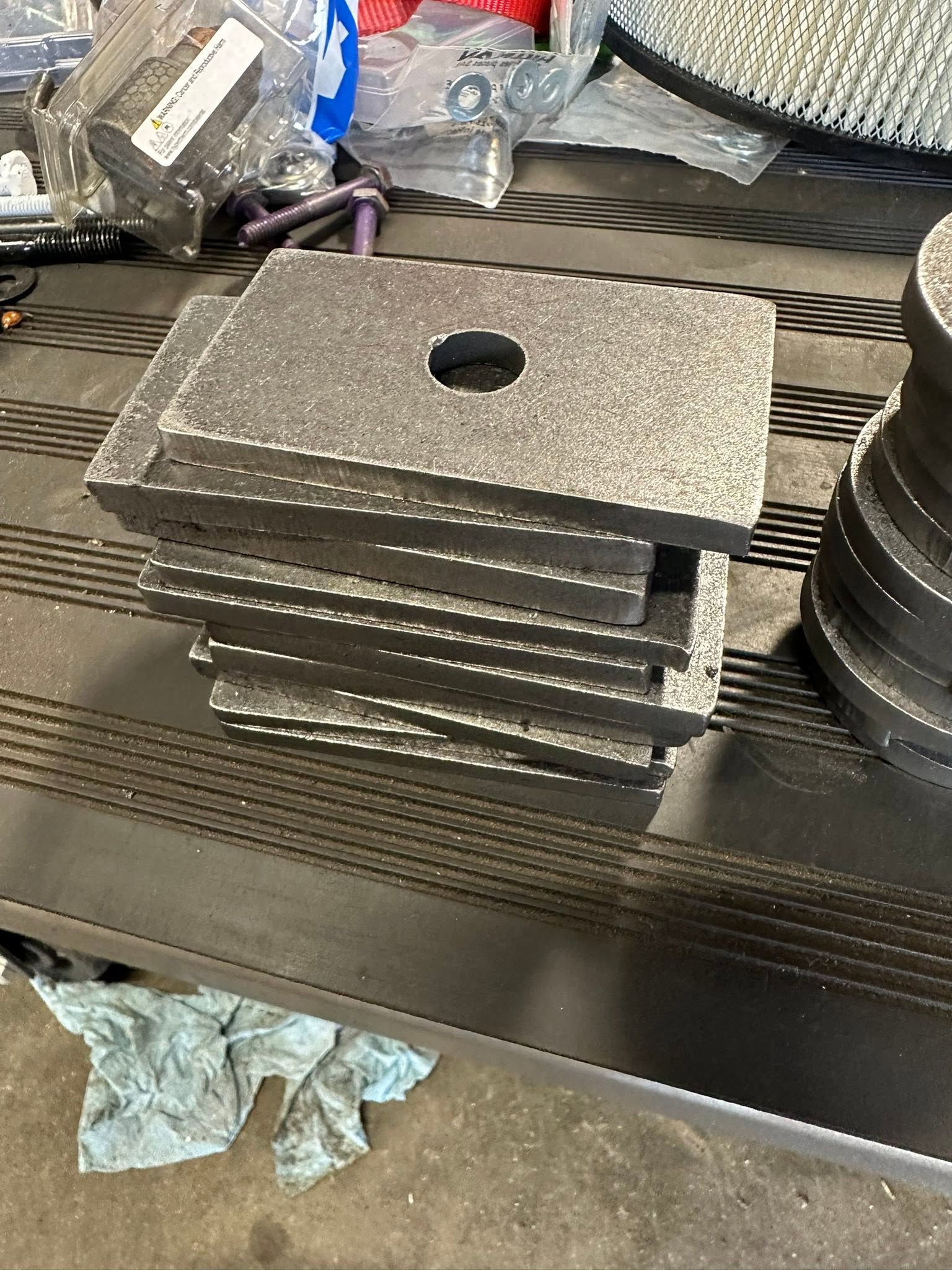 Stack of thick steel plates with center holes